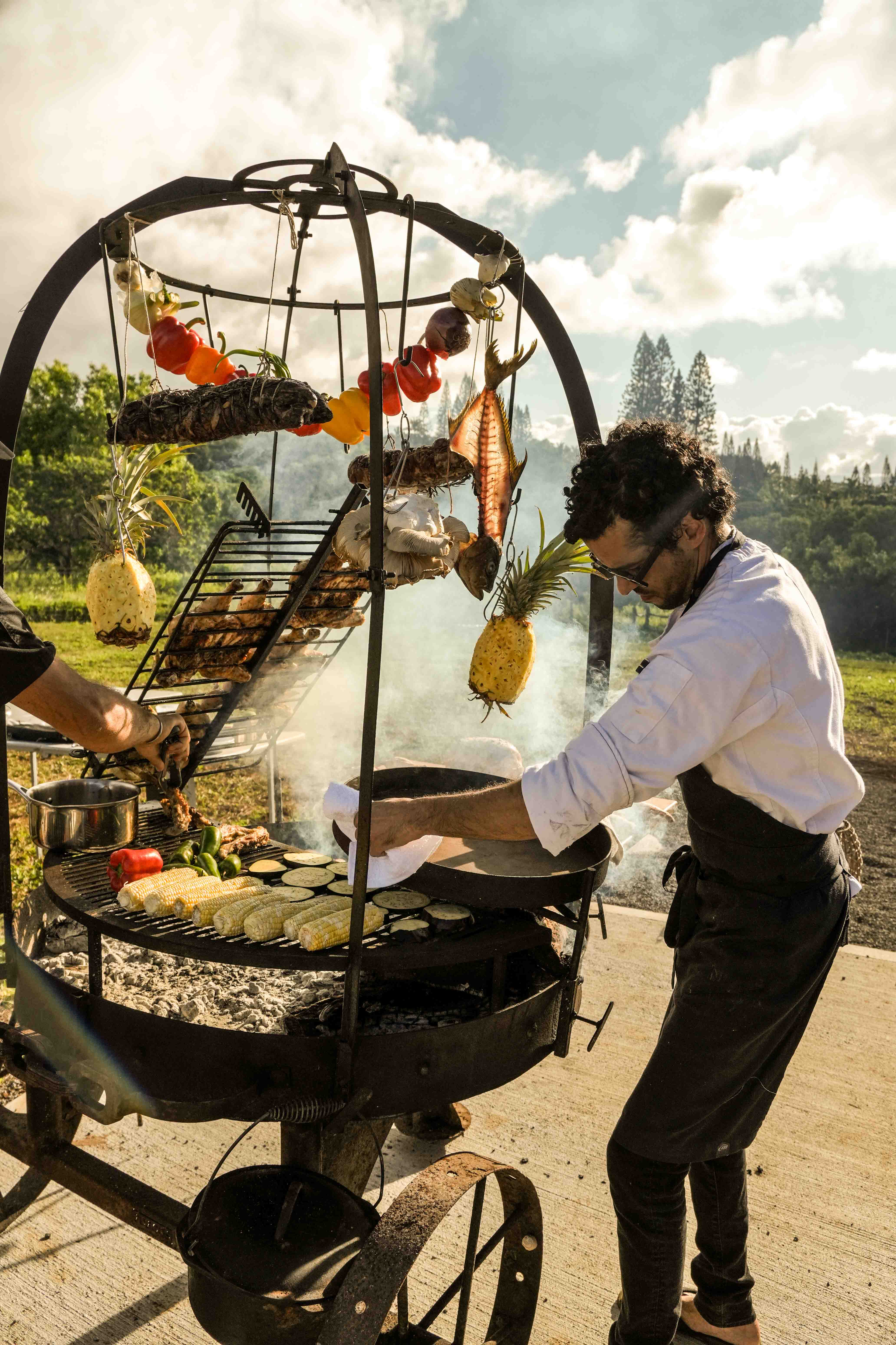 Chef Agustin cooking over the open asado fire